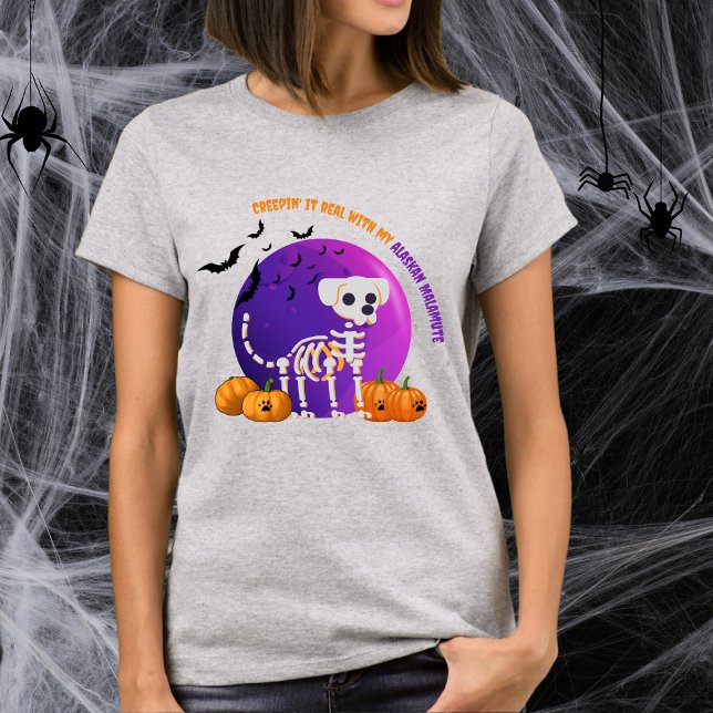 Scary Alaskan Malamute Halloween Skeleton T-shirt (Spooky Halloween t-shirt with a dog skeleton, full moon, pumpkins, bats, and your favorite dog breed)