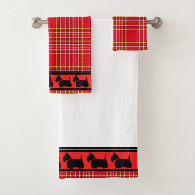 Scottish Terrier/col rouge/plaid rouge/frontière (En situation)