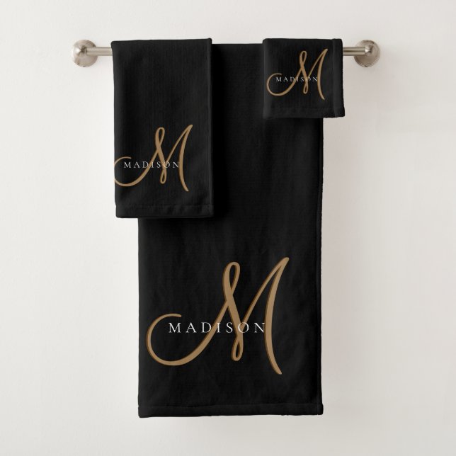 Script élégant de monogramme noir et or (En situation)