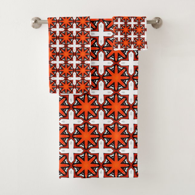 Serviette à motif géométrique rouge et orange (En situation)