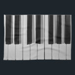 Serviette de cuisine faite sur commande de clavier<br><div class="desc">Si vous êtes un virtuose ou quelqu'un de piano qui peuvent à peine jouer des baguettes,  vous êtes sûrs d'aimer cette serviette de cuisine faite sur commande noire et blanche de clavier de piano.</div>