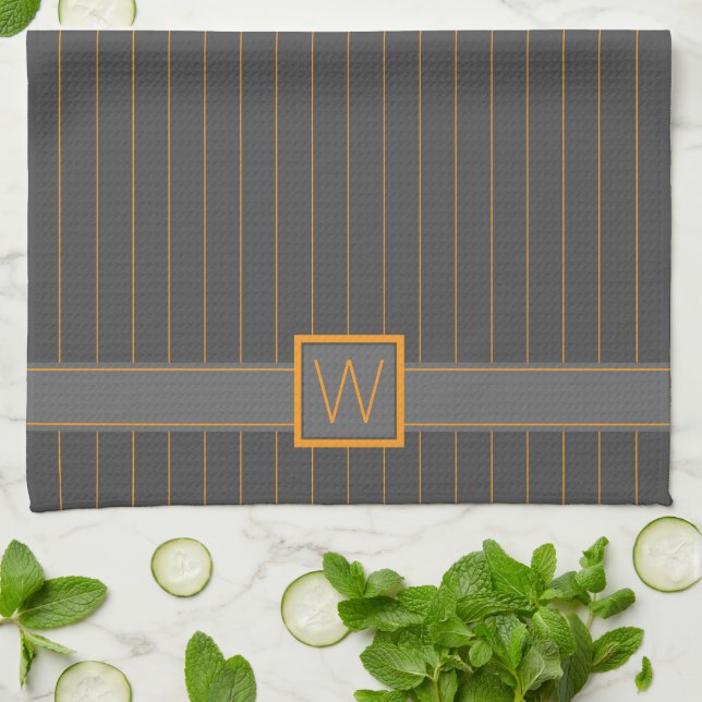 Serviette de cuisine grise avec rayures orange (Plié)