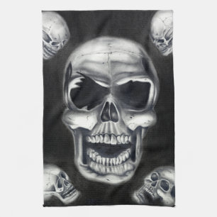 Serviette de cuisine noire de crânes humains