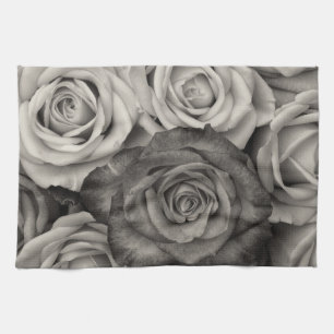 Serviette de cuisine noire de roses blancs
