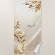 Serviette de plage à fleurs blanches et dorées