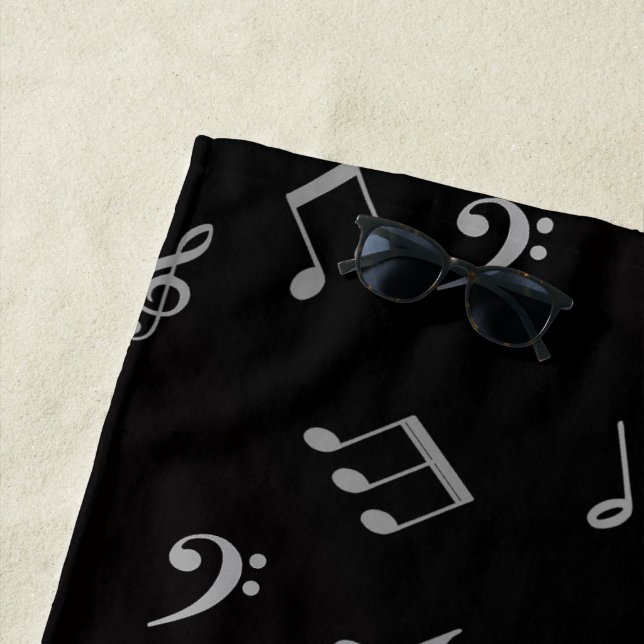 serviette de plage à notes de musique noire argent (En situation)
