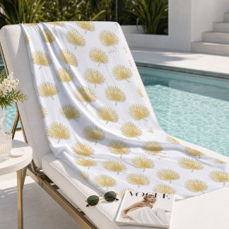 Serviette de plage aux feuilles de palmier dorées 