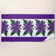Serviette de plage aux fleurs violettes