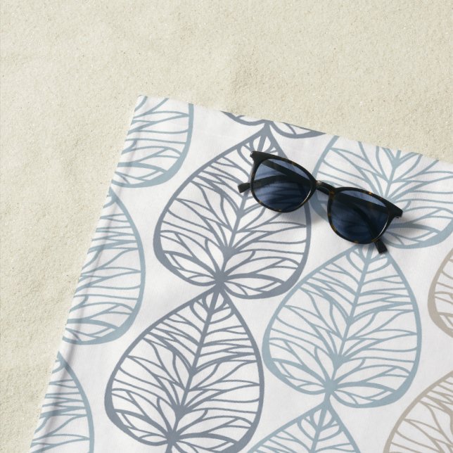 Serviette de plage aux ornements plantes abstraits (En situation)
