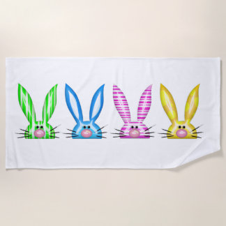 Serviette De Plage Des lapins colorés dans une rangée