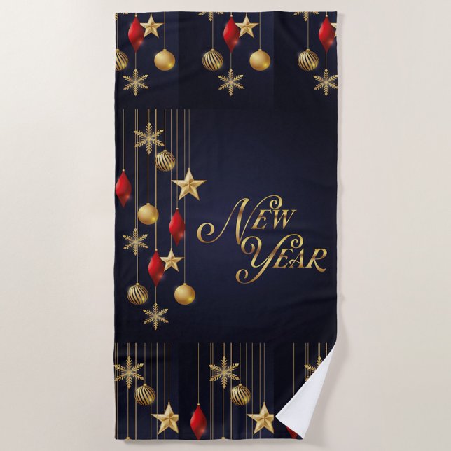 Serviette de plage du Nouvel An (A dark blue towel with a New Year's design. )