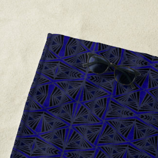 Serviette De Plage Motif géométrique bleu et noir.