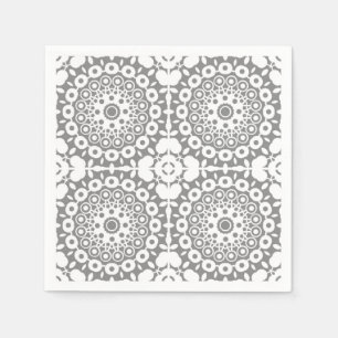 Serviette En Papier Carrés blancs dentés sur un arrière - plan gris cl