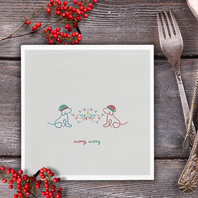 Serviette En Papier Chiens jouant avec des serviettes de Noël (Merry Merry Napkin featuring 2 cute dogs with winter hats and Christmas lights.  Holiday Party Time!)