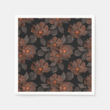 Fleurs orange et marron sur fond noir.