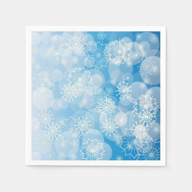 Serviette En Papier flocons de Noël sur un fond bleu          (Devant)