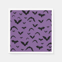 Flying bats on purple