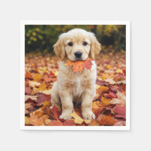 Serviette En Papier Jeune chiot Retriever doré dans des feuilles d'aut