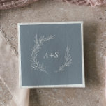 Serviette En Papier Minimal Leaf | Blue and White Monogram Wedding<br><div class="desc">These minimal leaf blue and white monogram wedding napkins are perfect for an elegant wedding. The design features a simple greenery silhouette in white on a dusty blue background with classic minimalist style. Personalize the napkins with the initials of the bride and groom.</div>