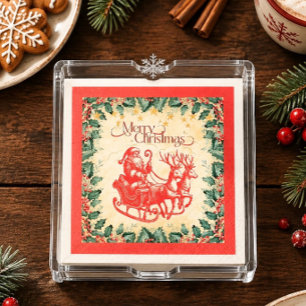 Serviette En Papier Père Noël vintage dans un traîneau sur papier roug