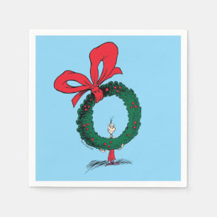 Serviette En Papier Qui regarde à travers la couronne de Noël