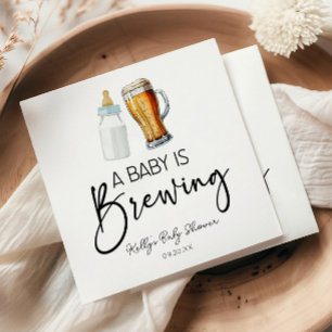 Serviette En Papier Un Bébé Brasse Une Bouteille Baby shower De Verre