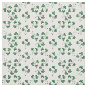 Shamrocks assez verts sur le tissu blanc de motif