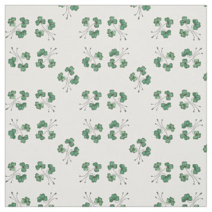 Shamrocks assez verts sur le tissu blanc de motif