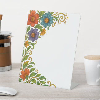 Signe De Table Conception de la marge de l'angle floral coloré