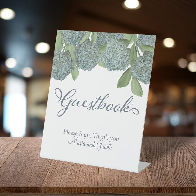 Signe De Table Dusty Blue élégant Floral Guestbook Réception (Blue hydrangea bouquet wedding guestbook sign with soft watercolor florals and elegant script)