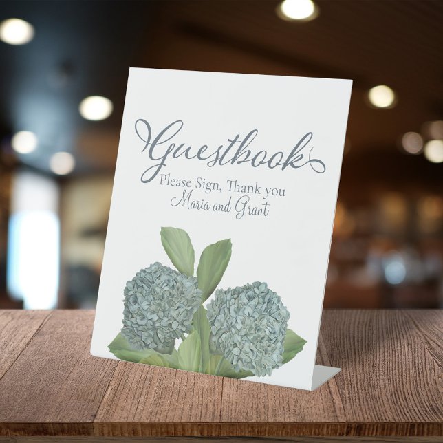 Signe De Table Dusty Blue élégant Floral Guestbook Réception (Blue hydrangea watercolor wedding guestbook sign with elegant script and botanical floral design.)