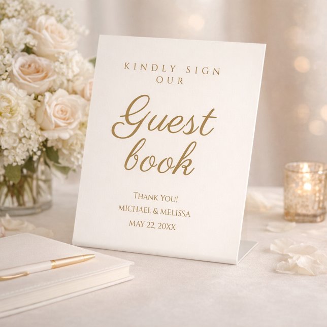 Signe De Table Elegant Ivory Gold Guest Book Message (Elegant ivory and gold guest book sign displayed on a styled reception table)