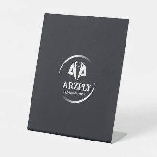 Signe De Table Il s'agit du logo du magasin de tissus blancs et g