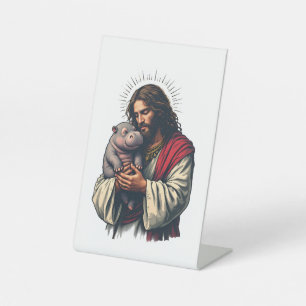 Signe De Table Jésus tenant un bébé Moo Deng Hippo