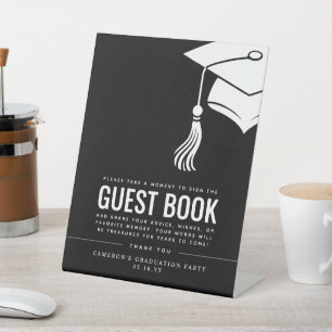 Signe De Table Livre d'or de remise de diplômes avec chapeau et g