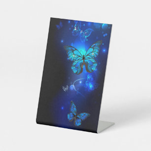 Signe De Table Morpho Butterfly in the Dark Background
