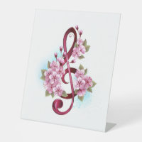 Musical treble clef notes with sakura flowers