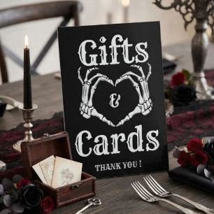 Signe De Table Pancarte de mains de crâne de cadeaux et de cartes