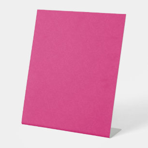 Signe De Table Surface rose texturée avec un motif subtil tourbil