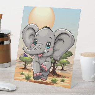 Signe De Table Un bébé éléphant qui sonne heureux dans la savane