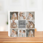 Signe En Bois Collage familial photo et cadeau gris personnalisé<br><div class="desc">Créez un collage familial magnifique et personnalisé avec huit photos, accompagné d'un nom de famille personnalisé en gris. Ce cadeau unique et réfléchi est parfait pour commémorer des moments spéciaux et célébrer l'amour et le lien au sein d'une famille. Le collage présente huit photos soigneusement sélectionnées que vous pouvez fournir,...</div>