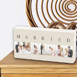 Signe En Bois MARIED 7 Photo Collage naturel et noir<br><div class="desc">Boîtier moderne en bois, personnalisé avec vos photos mariages. Un design élégant dans une palette de couleurs neutres, naturelles et noires - parfait pour les jeunes mariés et cadeaux d'anniversaire. Le modèle photo est configuré pour vous pour ajouter 7 de vos photos préférées qui sont affichées au format portrait dans...</div>