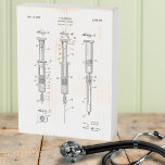 Signe En Bois Symbole vintage de la seringue hydrodermique Breve<br><div class="desc">C'est le cadeau parfait pour le professionnel de la santé ou l'étudiant dans votre vie! L'empreinte de conception de brevet de 1947 pour l'aiguille hypodermique est à la maison sur un panneau vintage blanc en bois affaissé. Il fait un accessoire et une pièce de conversation insolite pour n'importe quel bureau...</div>