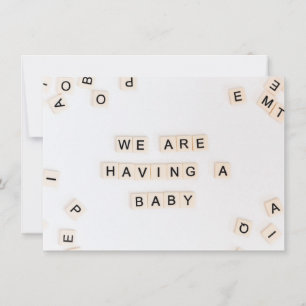 Simple annonce de naissance sur des pierres à lett
