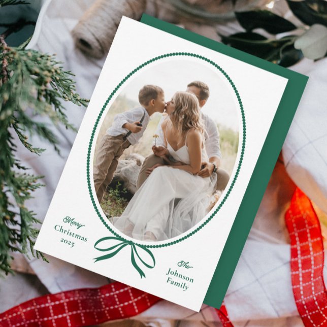 Simple Carte de Noël avec un nœud vert ovale (Had drawn bow oval frame classic photo Christmas holiday cards.)