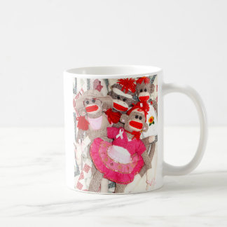 Singes de chaussette pour la tasse de ruban de