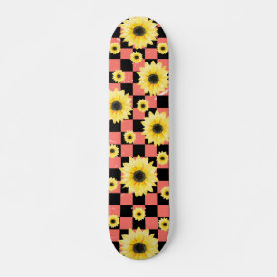 Skateboard à damiers et tournesol rose et noir