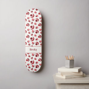 Skateboard Cercles abstraits et croissants en rouge plus Nom