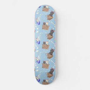 Skateboard Chats en boîte et gouttes de lait sur bleu