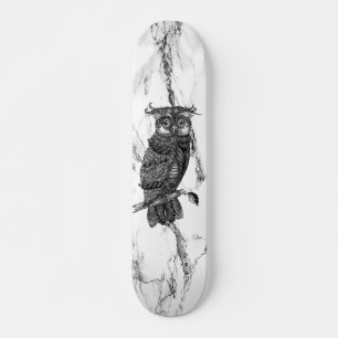 Skateboard Chouette camouflée sur marbre